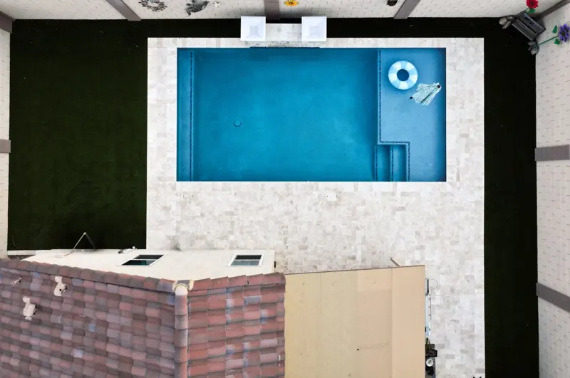 Top-down drone shot of a new pool, filmed by Maken Media