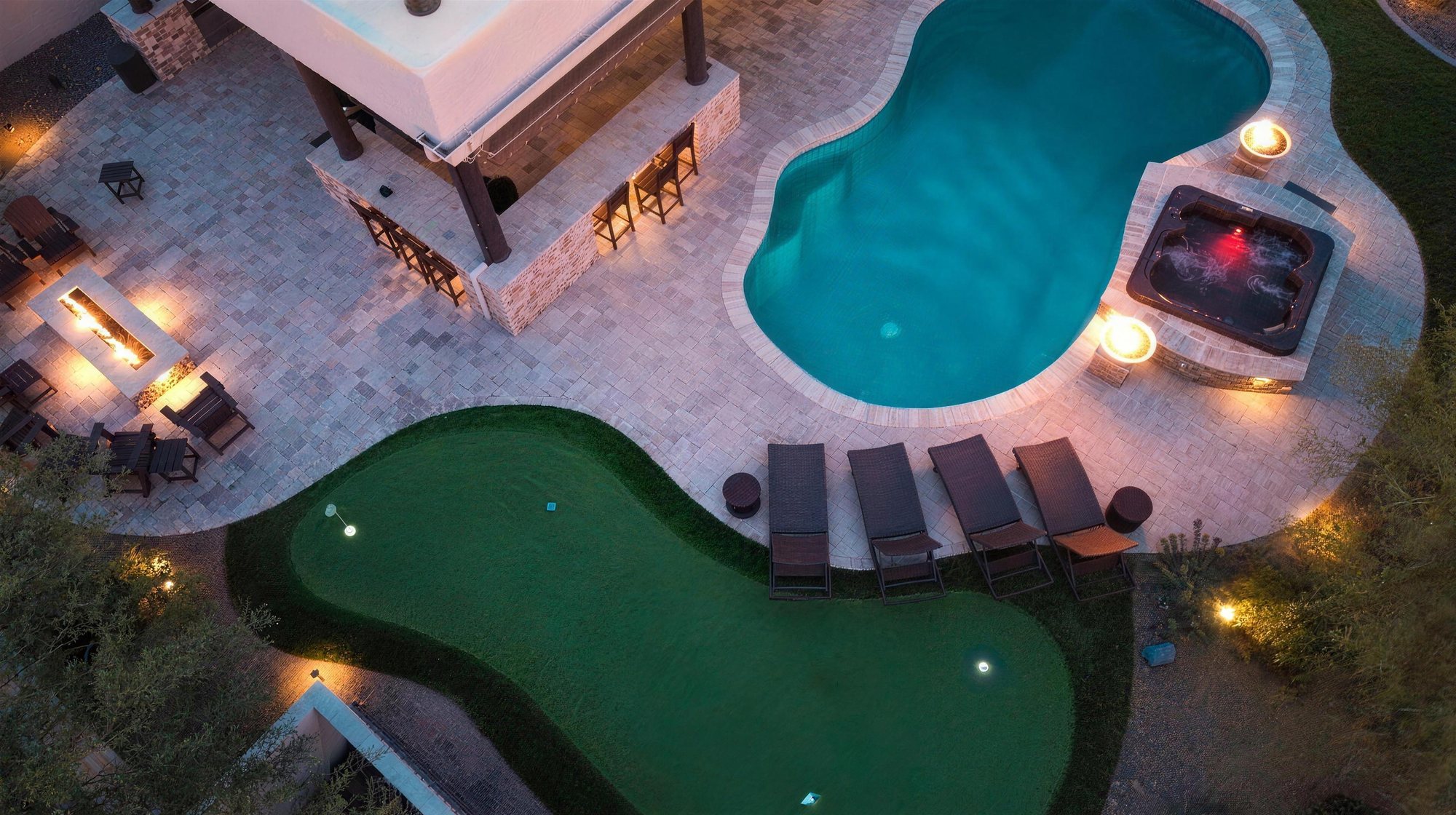Finished backyard pool build at dusk